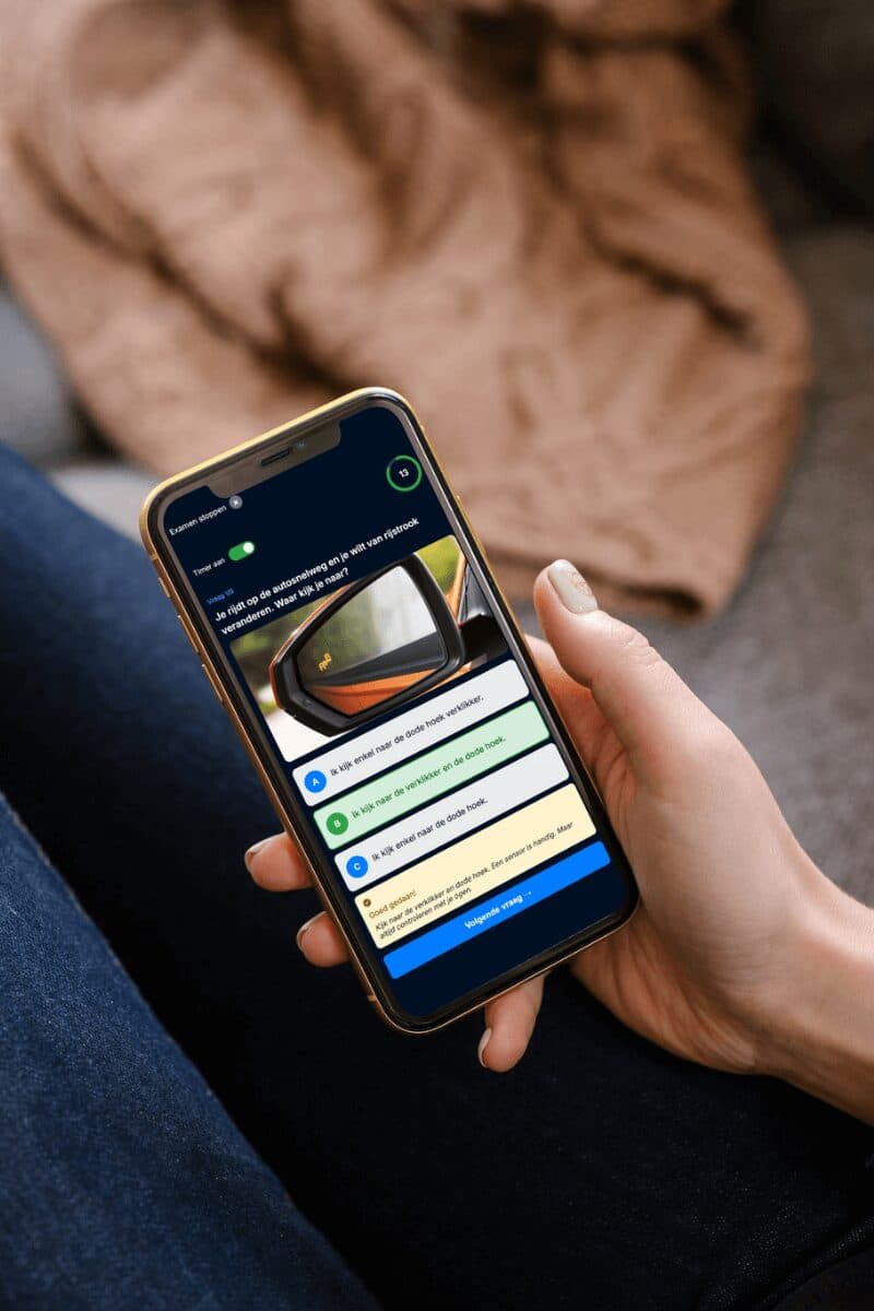 Person practicing scooter theory on smartphone